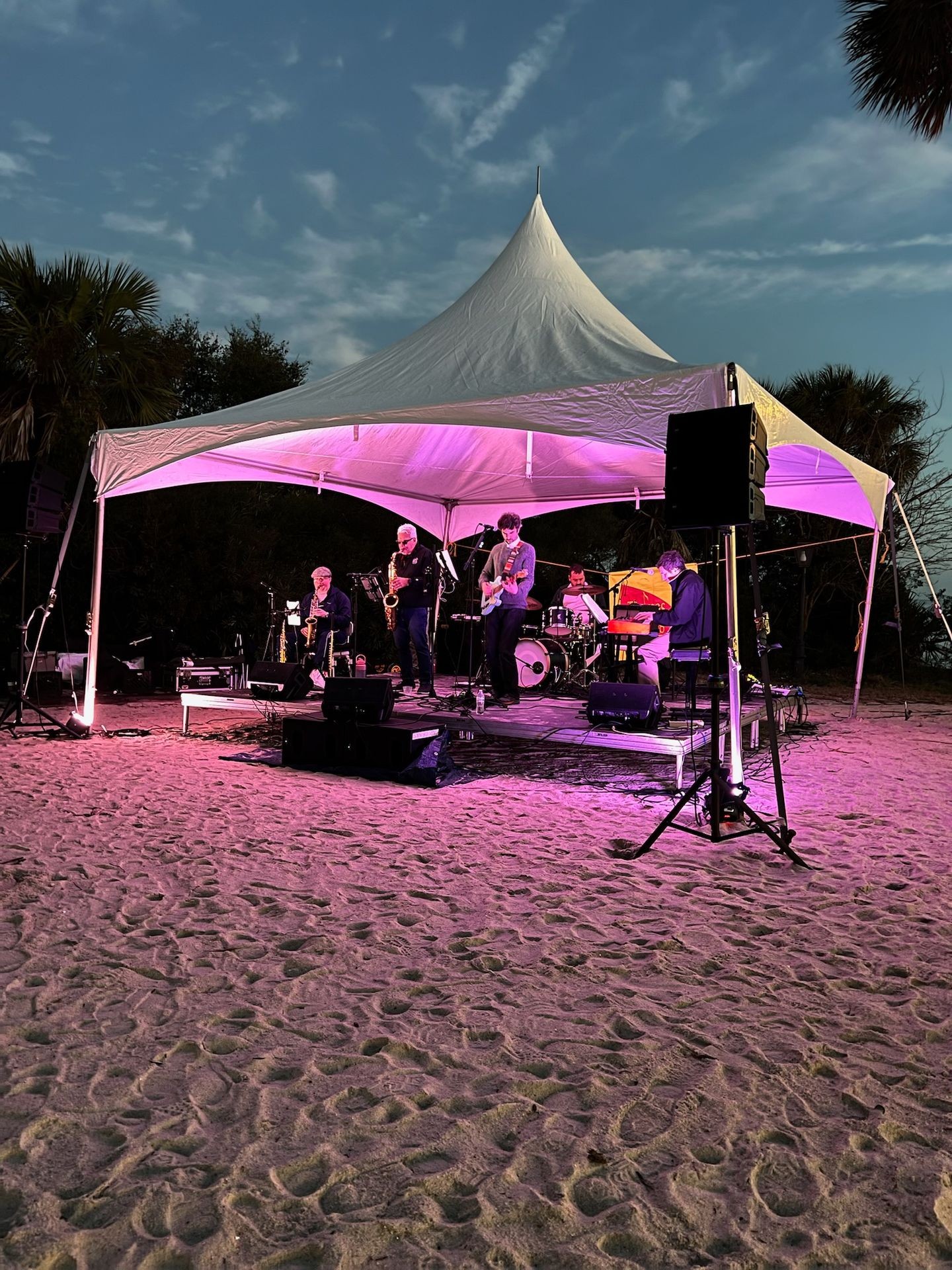 photo of band under tent